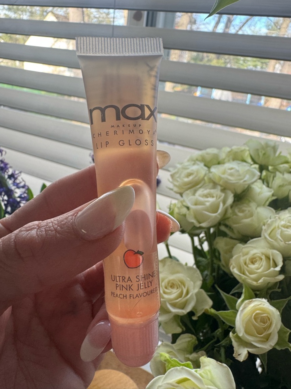 Max Makeup Cherimoya Ultra Shine Pink Jelly Lip Gloss in the peach flavor